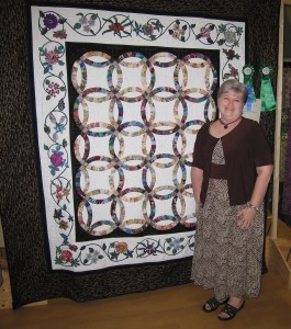 Linda Katherman with her quilt Oriental Beauty